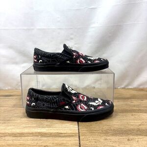 Vans Black and Red Spider Web Slip-On Sneakers. These glow in the dark